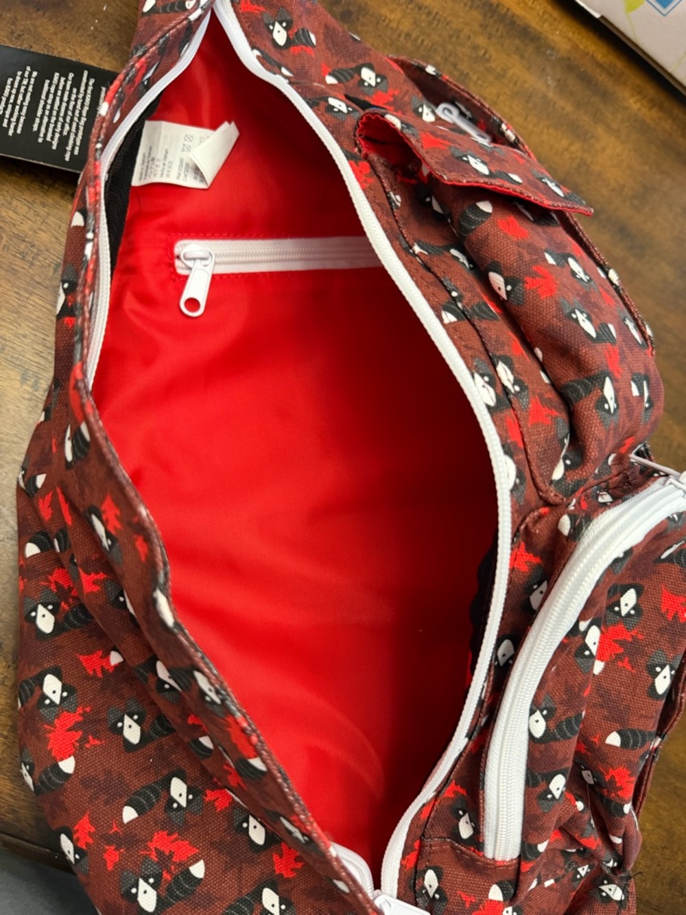 Kavu Red Patterned Sling Pack with Brown Strap - Picture 4 of 5